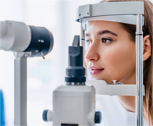 A woman receiving an eye exam at Crowder Eye Center.