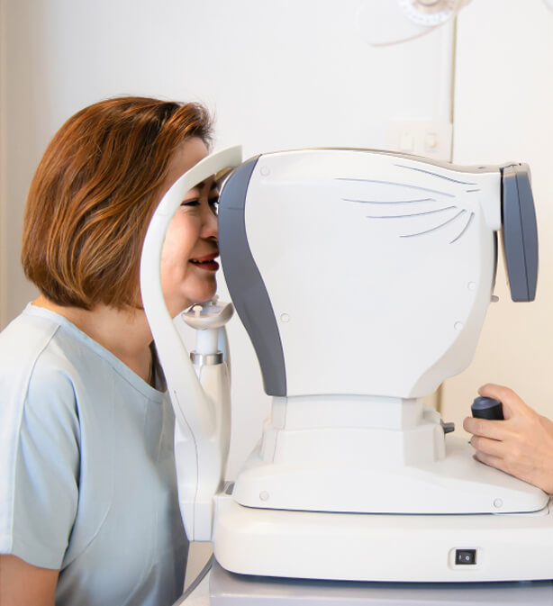 woman taking an eye exam