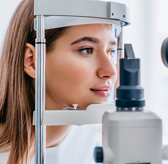 Woman taking eye exam