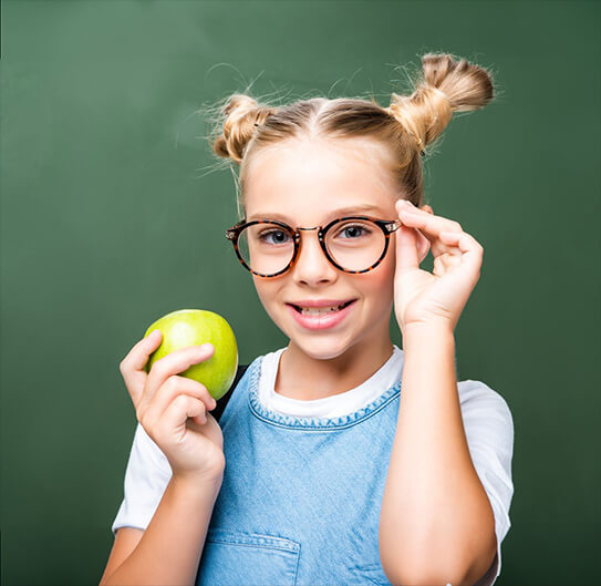 young girl wearing her eyeglasses happily